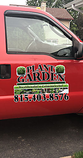 Dedicated landscapers at work on a residential project in Harvard IL