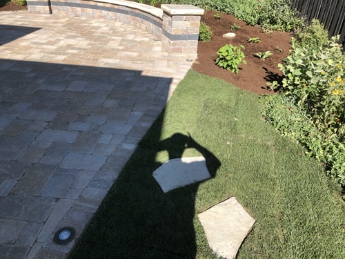 New brick paver patio installation by Plant Garden Landscaping in Harvard IL