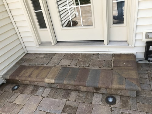 Spacious brick patio perfect for outdoor gatherings and relaxing